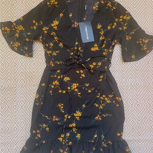 PrettyLittleThing Black Midi Dress with Yellow Floral Print